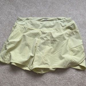Athleta girl lined short XL soft lime green excellent used condition